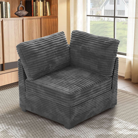 Grey corduroy modular corner chair with plush cushions