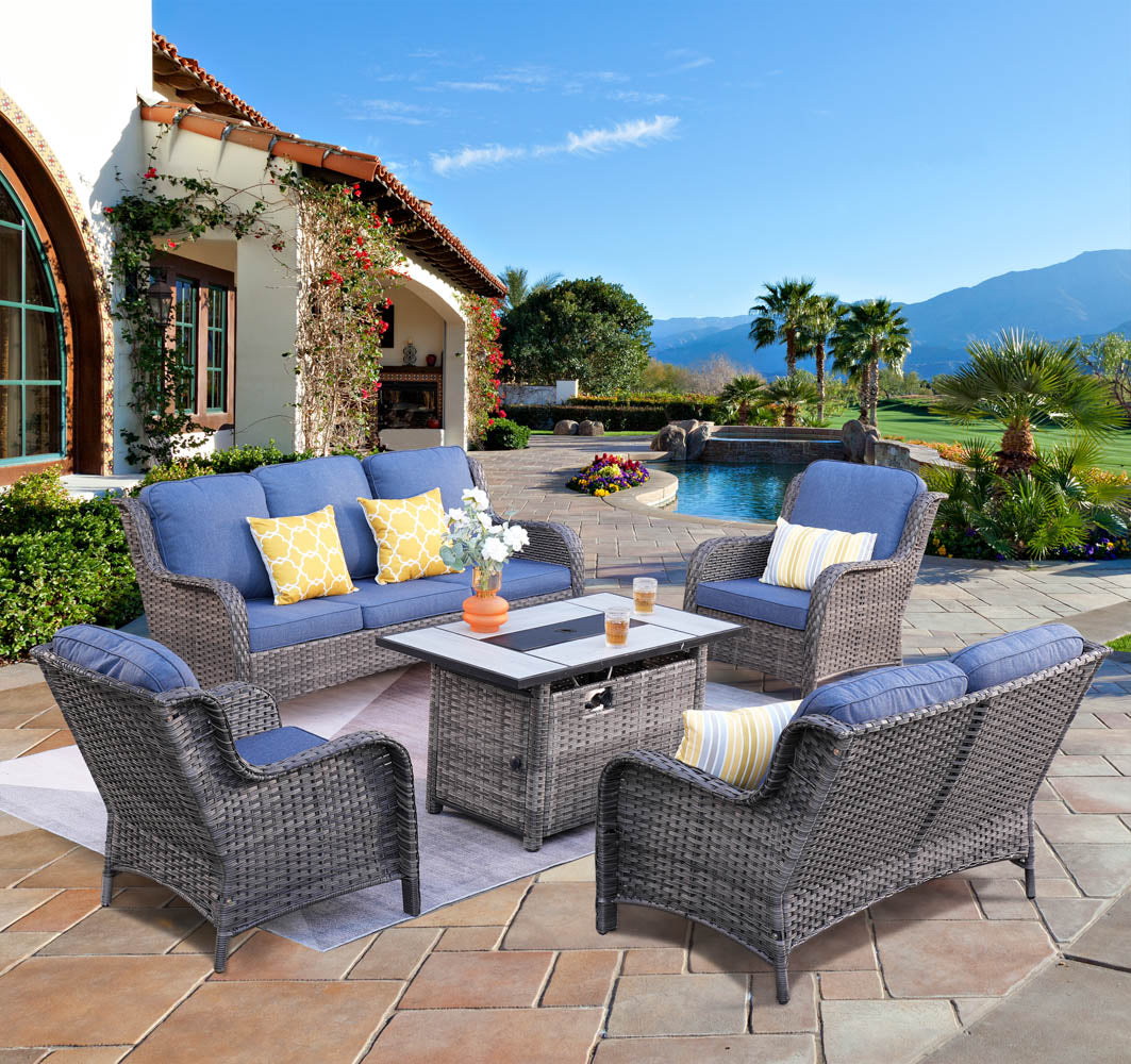Wicker patio furniture set with fire pit table and blue cushions. #color_Grey Wicker Denim Blue Cushion