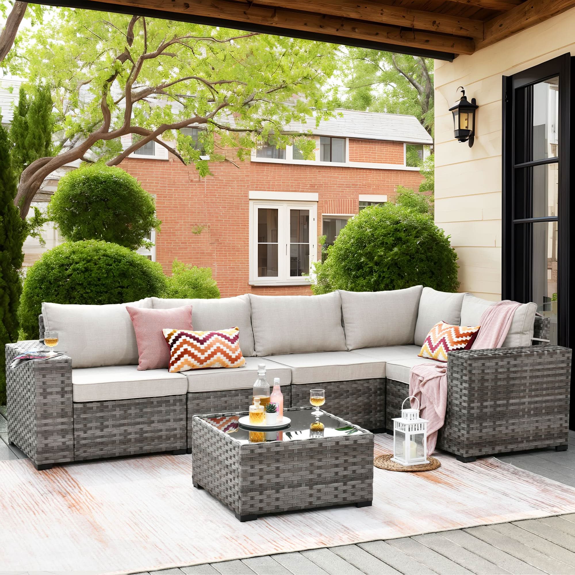Beige | OVIOS outdoor sectional sofa set with gray wicker frame, beige cushions, and decorative pillows on patio