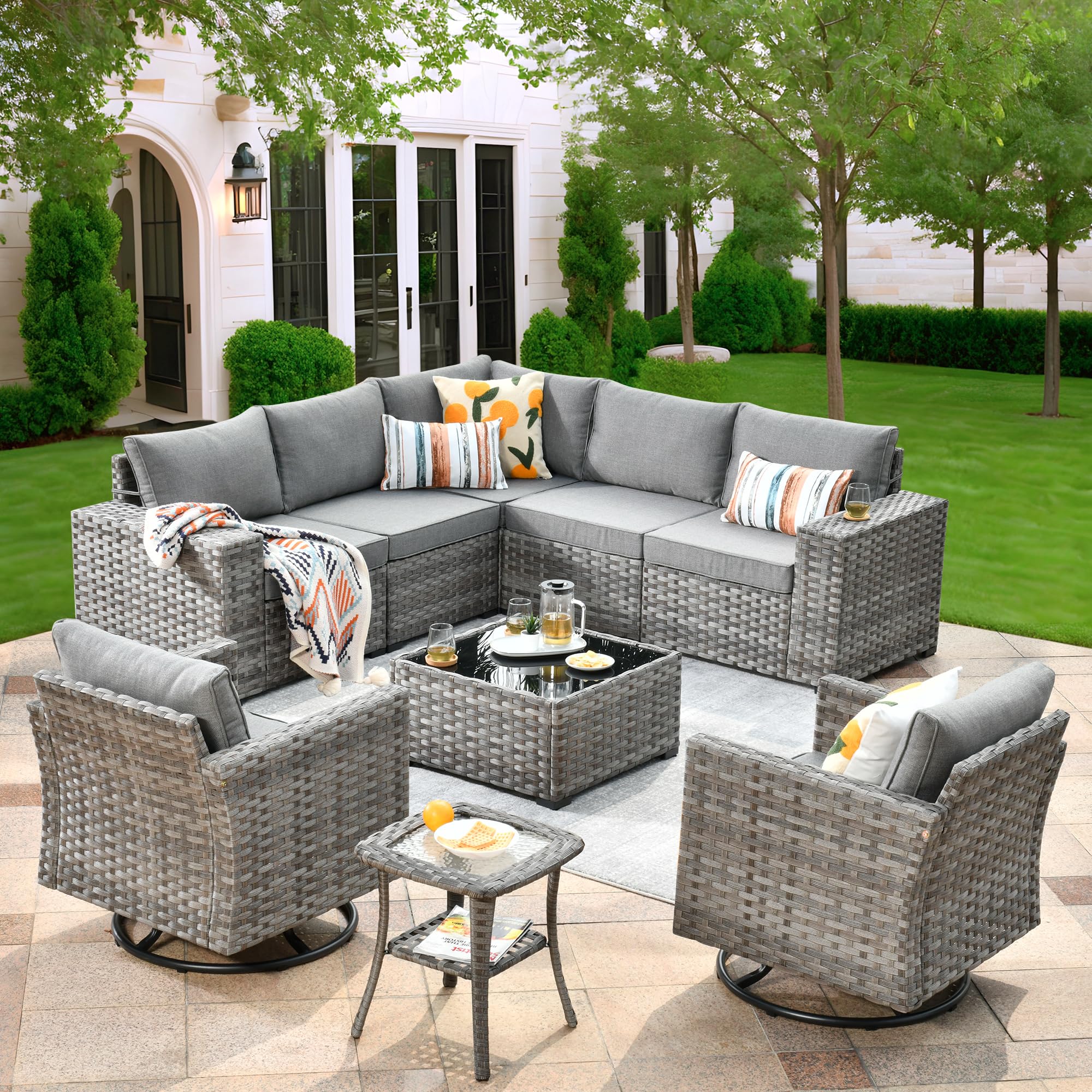 OVIOS 9-Piece Outdoor Furniture Set in gray wicker with swivel chairs and Dark Grey cushions on a patio for relaxation.