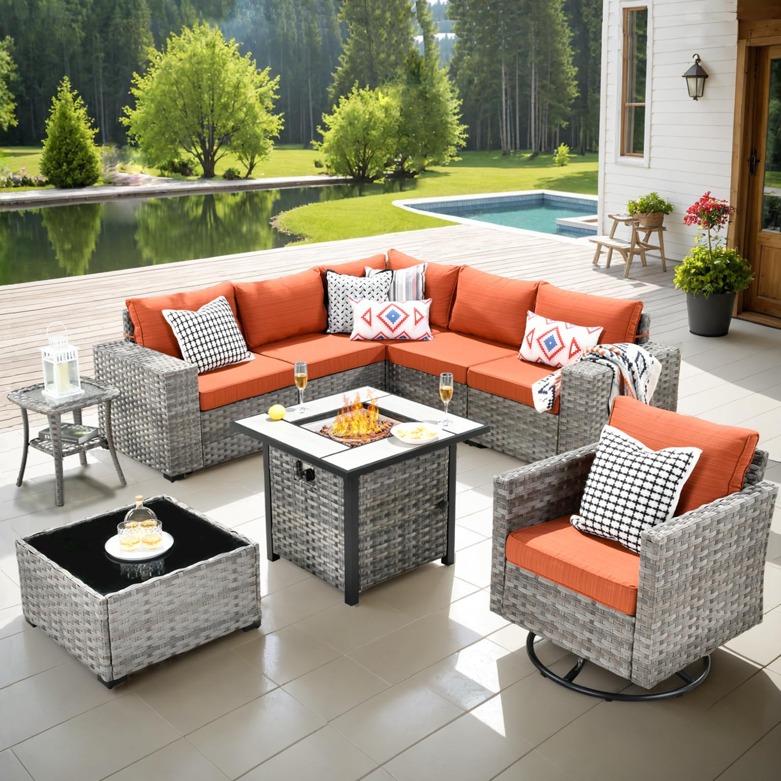 Orange Red Ovios 9-piece grey rattan outdoor sectional sofa set with orange cushions, swivel chair, and fire pit table.