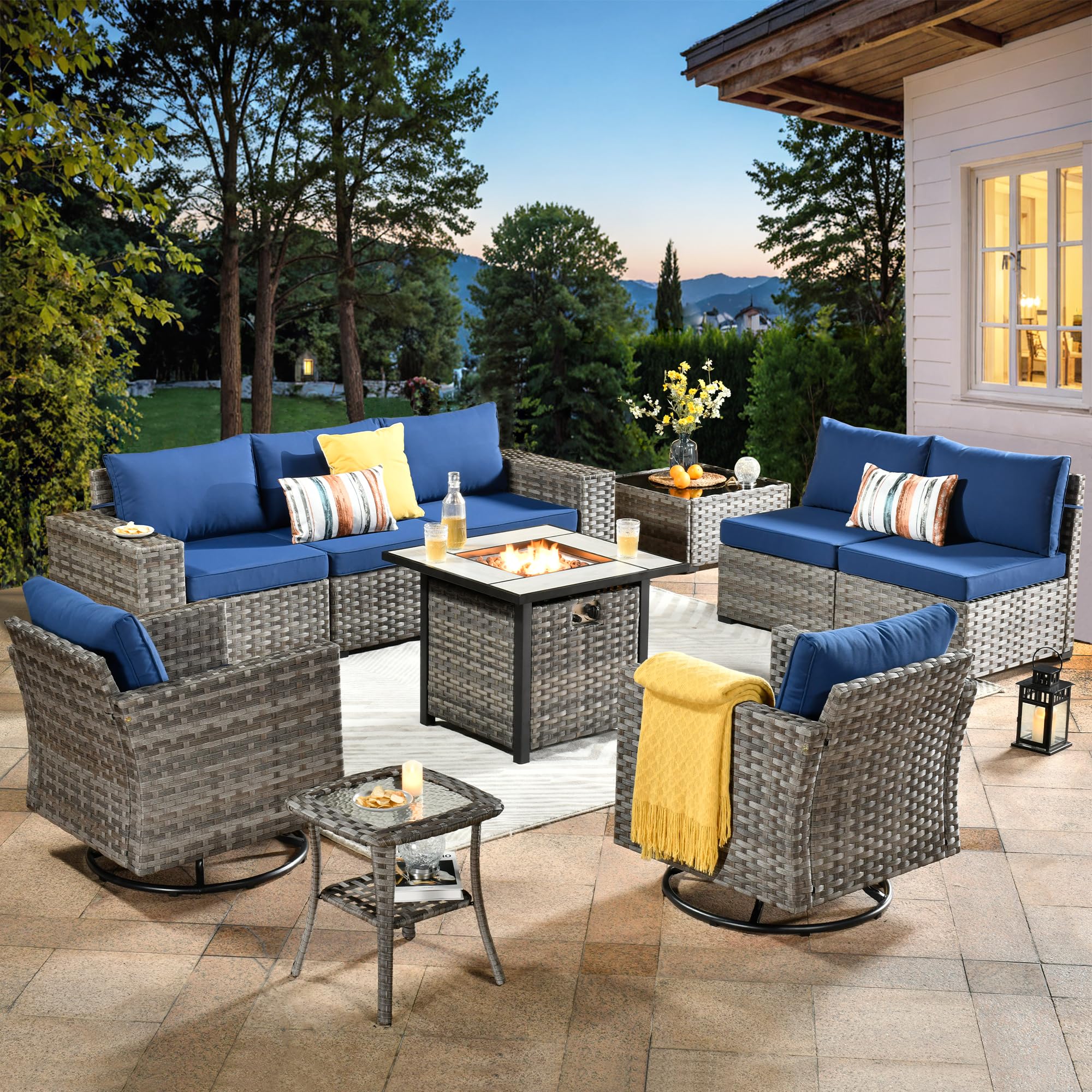 OVIOS 10-Piece patio set with fire pit table, gray wicker and blue cushions. Outdoor relaxation at dusk.