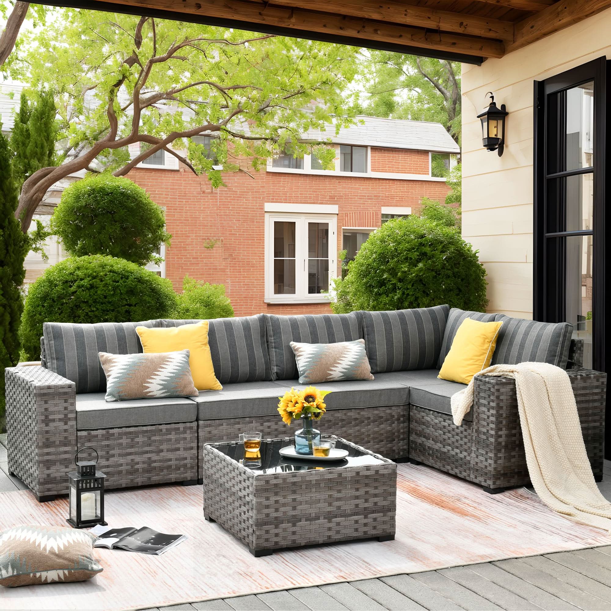 OVIOS outdoor sectional sofa set with gray wicker frame and strip grey cushions, coffee table on patio, ergonomic backrest support.