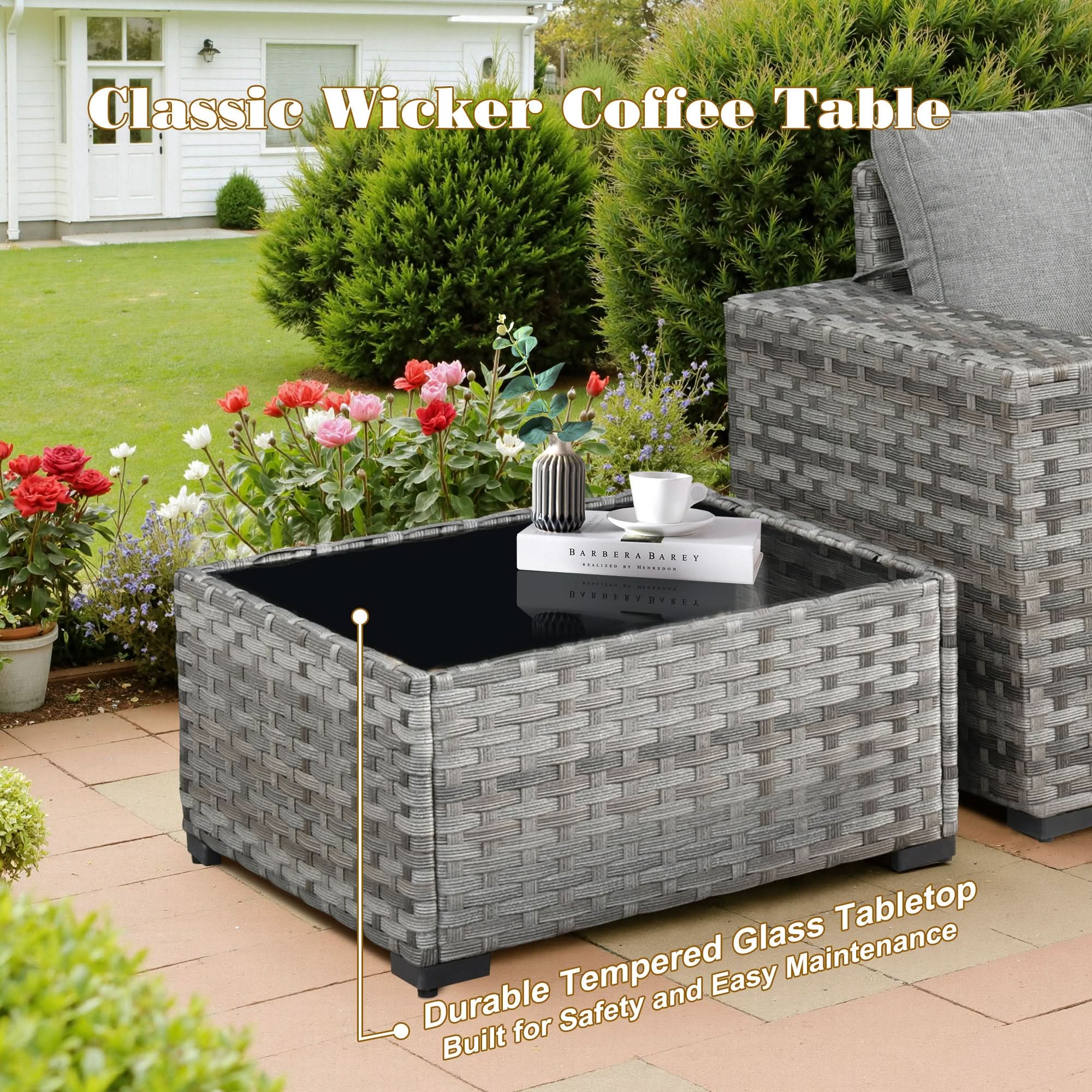 Grey wicker coffee table with tempered glass top, part of outdoor patio furniture set.Dark Grey