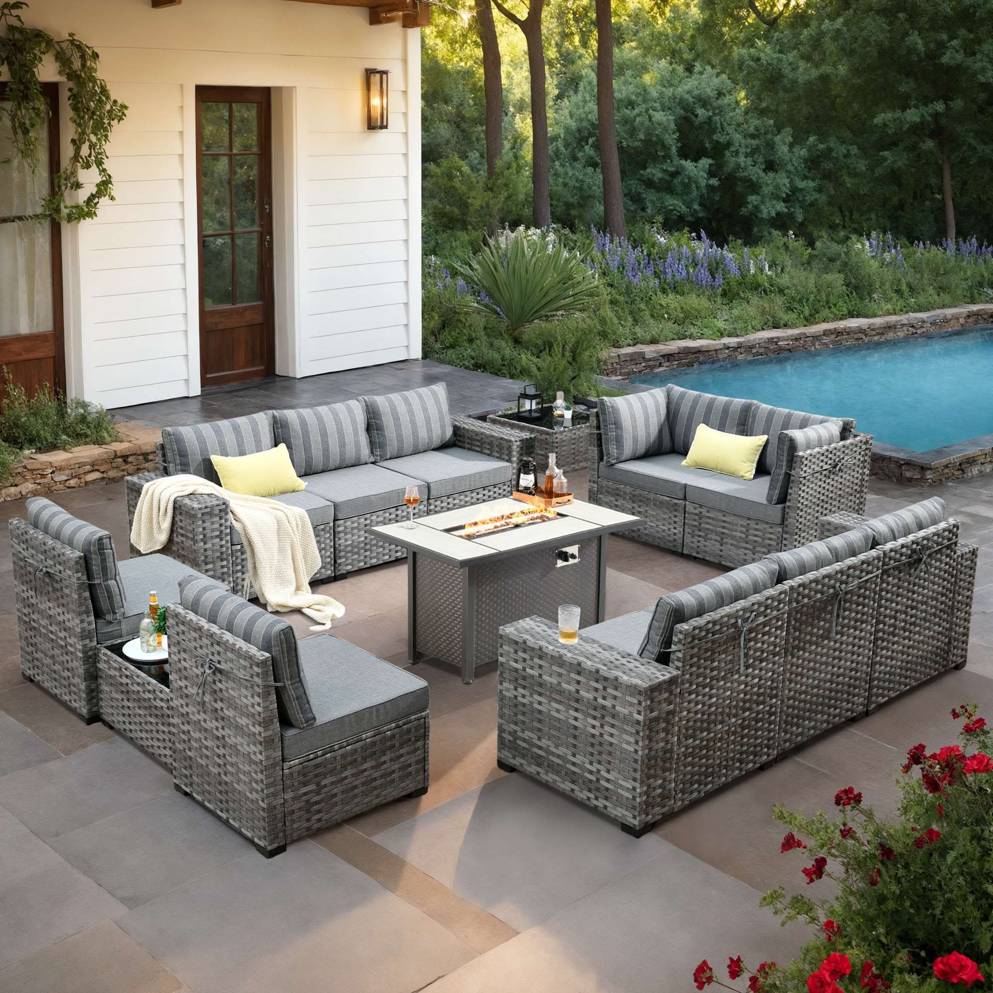 strip grey OVIOS grey rattan sectional patio set with fire pit table, armrest & rocking chairs.