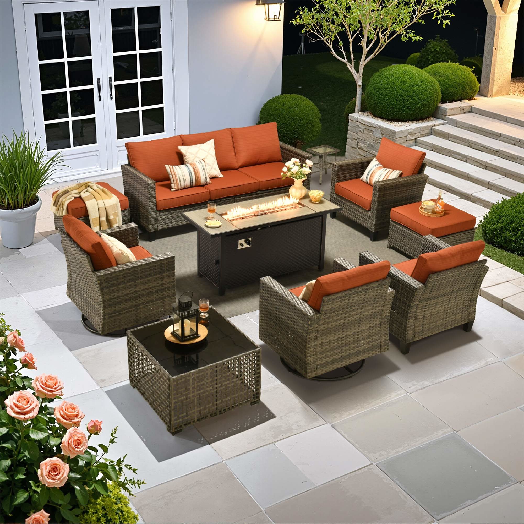 Orange | OVIOS 10-piece rattan patio conversation set with fire pit and swivel chairs, orange cushions