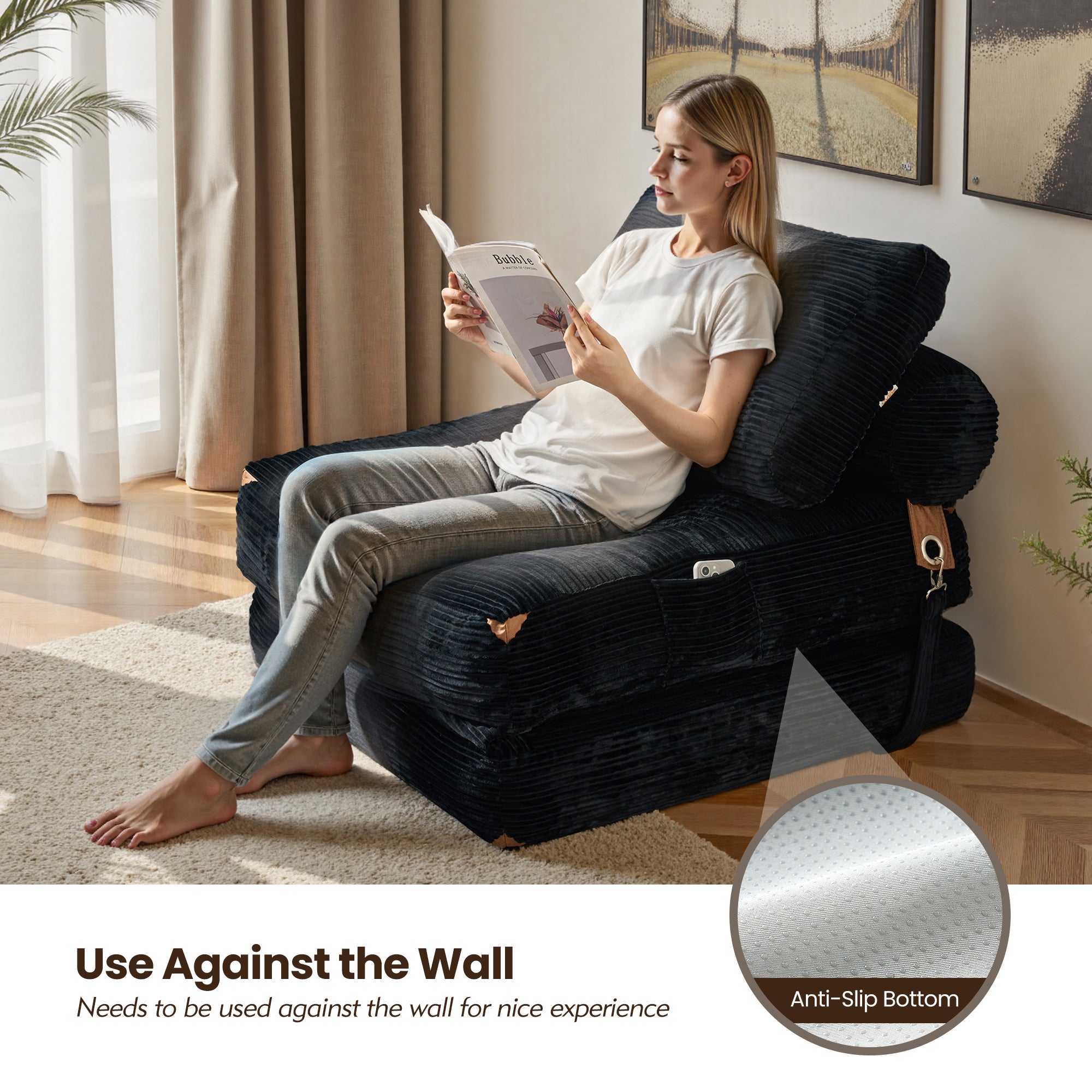 Ovios folding sofa bed in black corduroy, with anti-slip bottom, for relaxation in a small space.