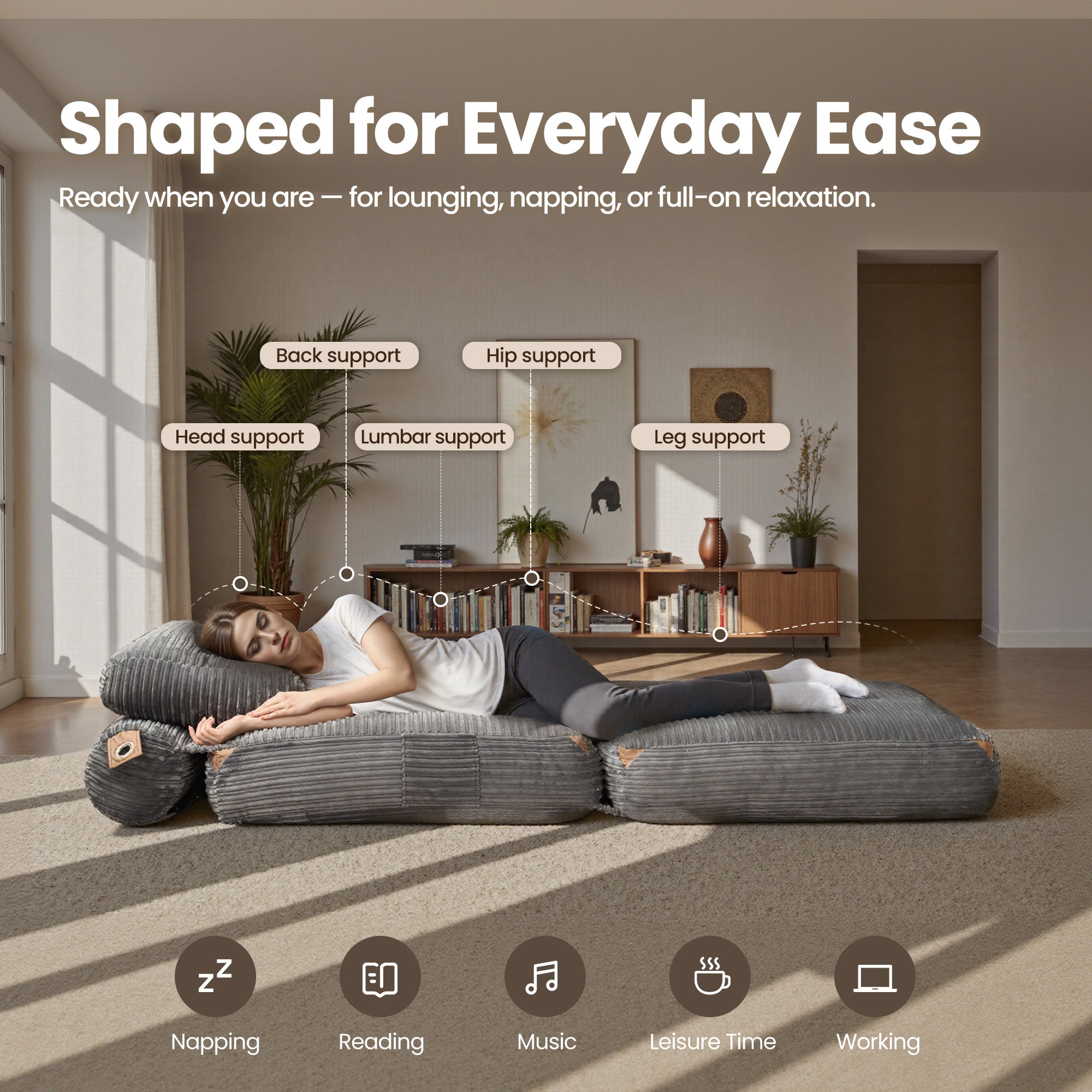 Grey Ovios bean bag bed for relaxation, featuring head, back, and leg support. Ideal for napping and leisure.