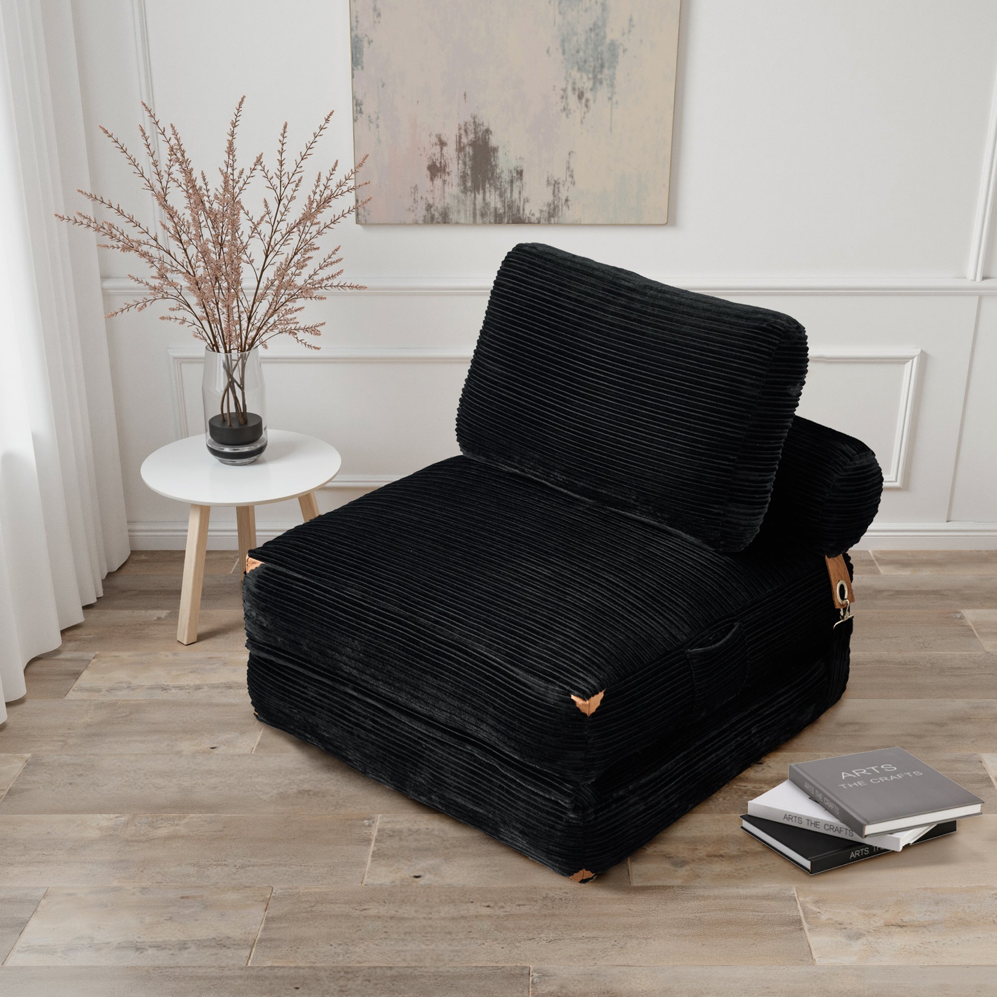 Ovios black corduroy folding sofa bed chair, perfect for small spaces and modern interiors