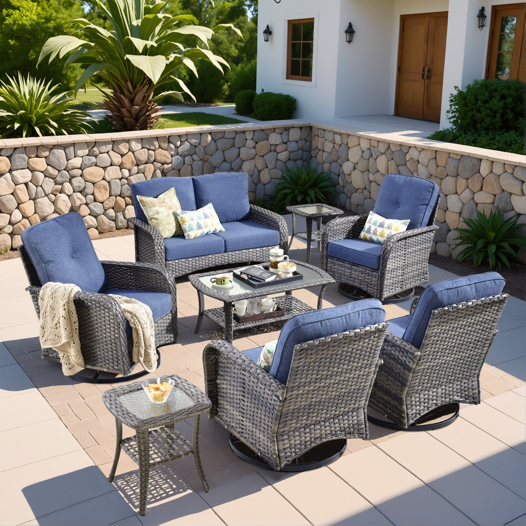 OVIOS 8-Piece Patio Furniture Set with gray wicker sofa, swivel chairs, blue cushions