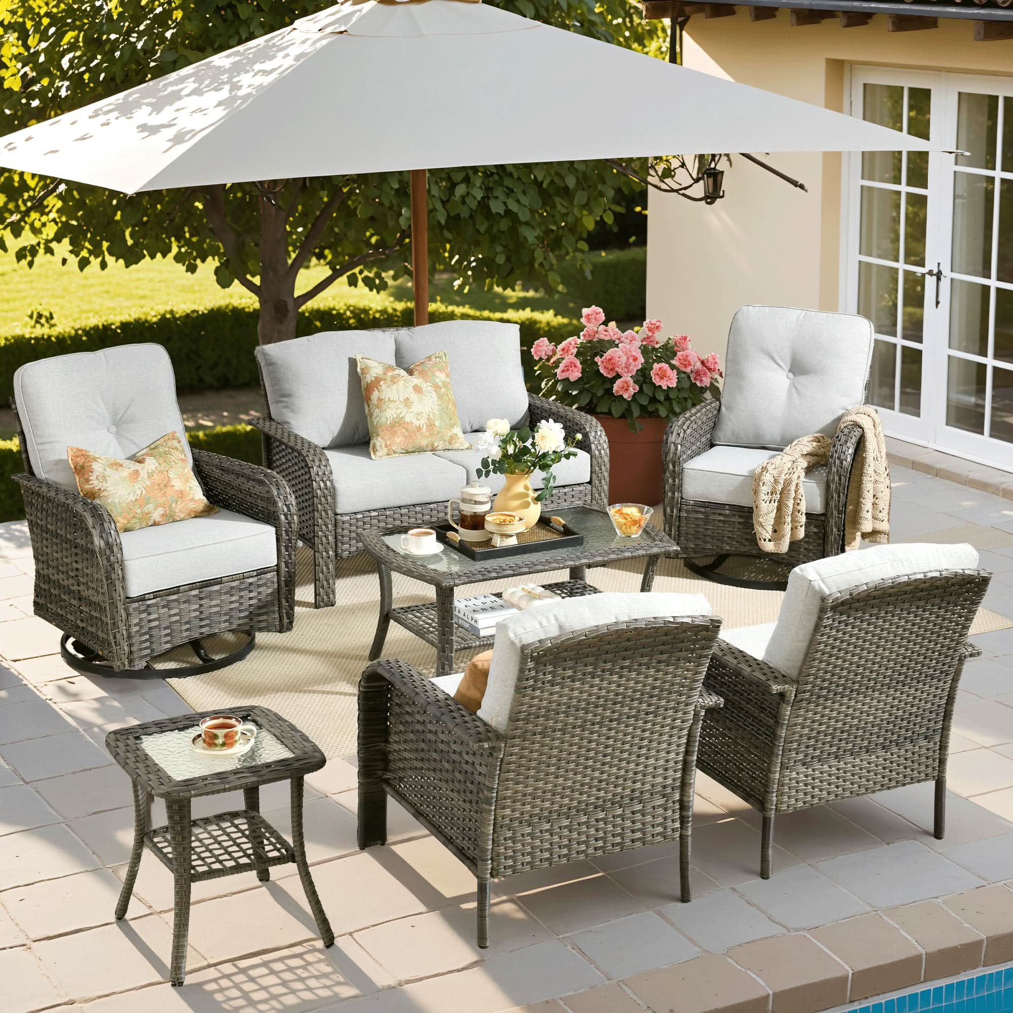OVIOS 7-piece gray wicker patio set with swivel chairs, gray cushions, and a coffee table for outdoor use