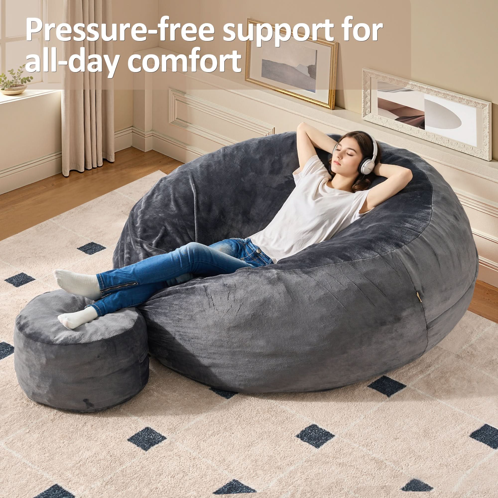 Gray OVIOS bean bag chair with ottoman. Woman relaxing, flannel cover. Pressure-free comfort for living room.