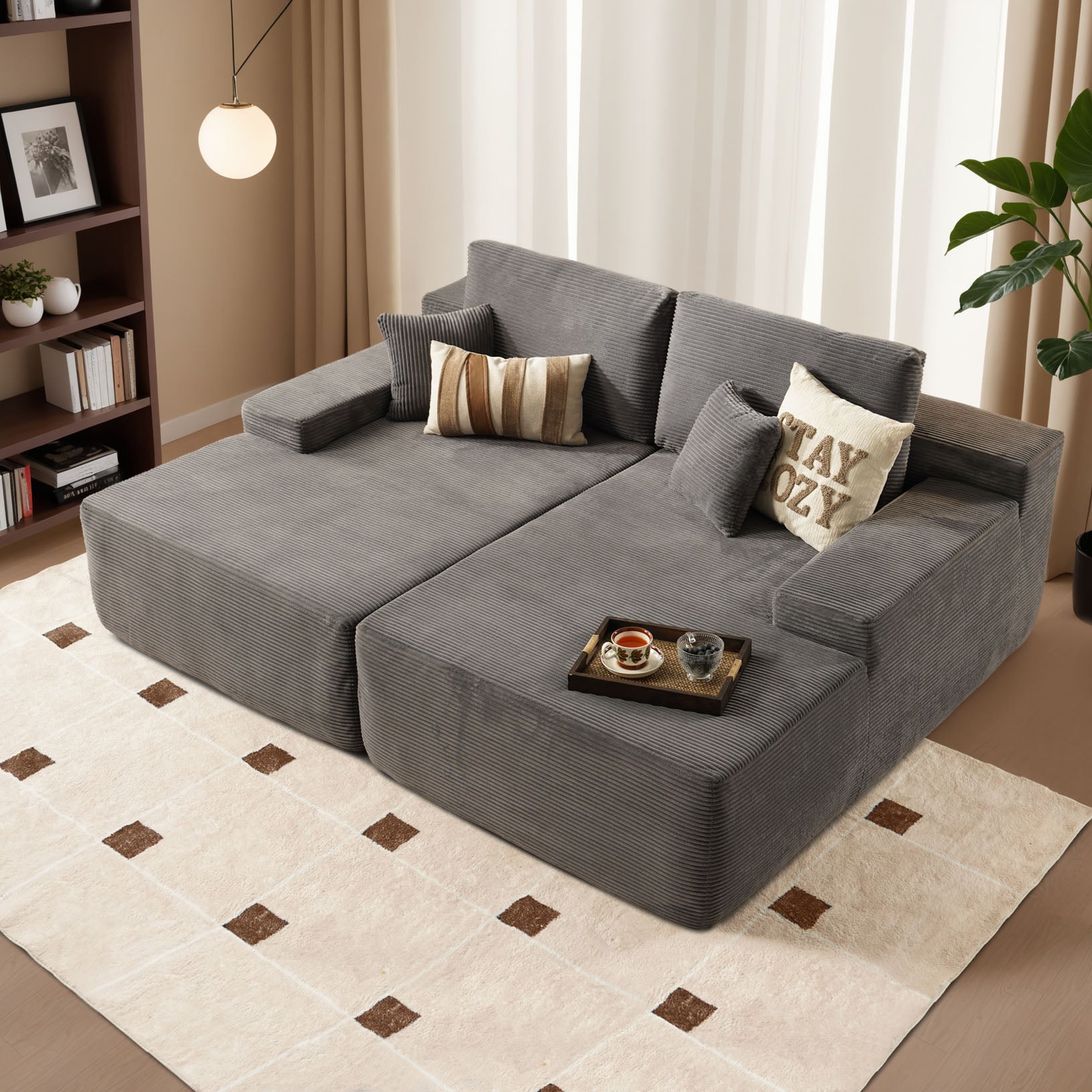 Ovios gray corduroy sectional sofa with chaise lounge, featuring STAY OZY pillow and wide armrest for maximum comfort