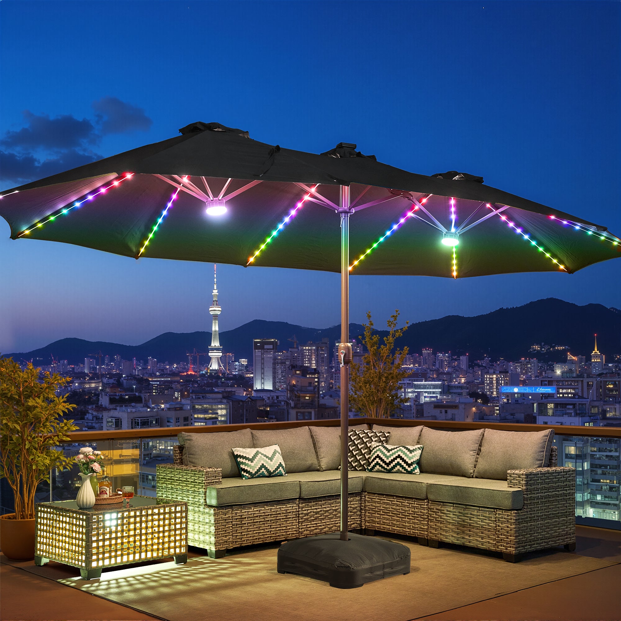 Dark Grey | OVIOS solar patio umbrella with vibrant RGB LED lights, set on balcony at night.
