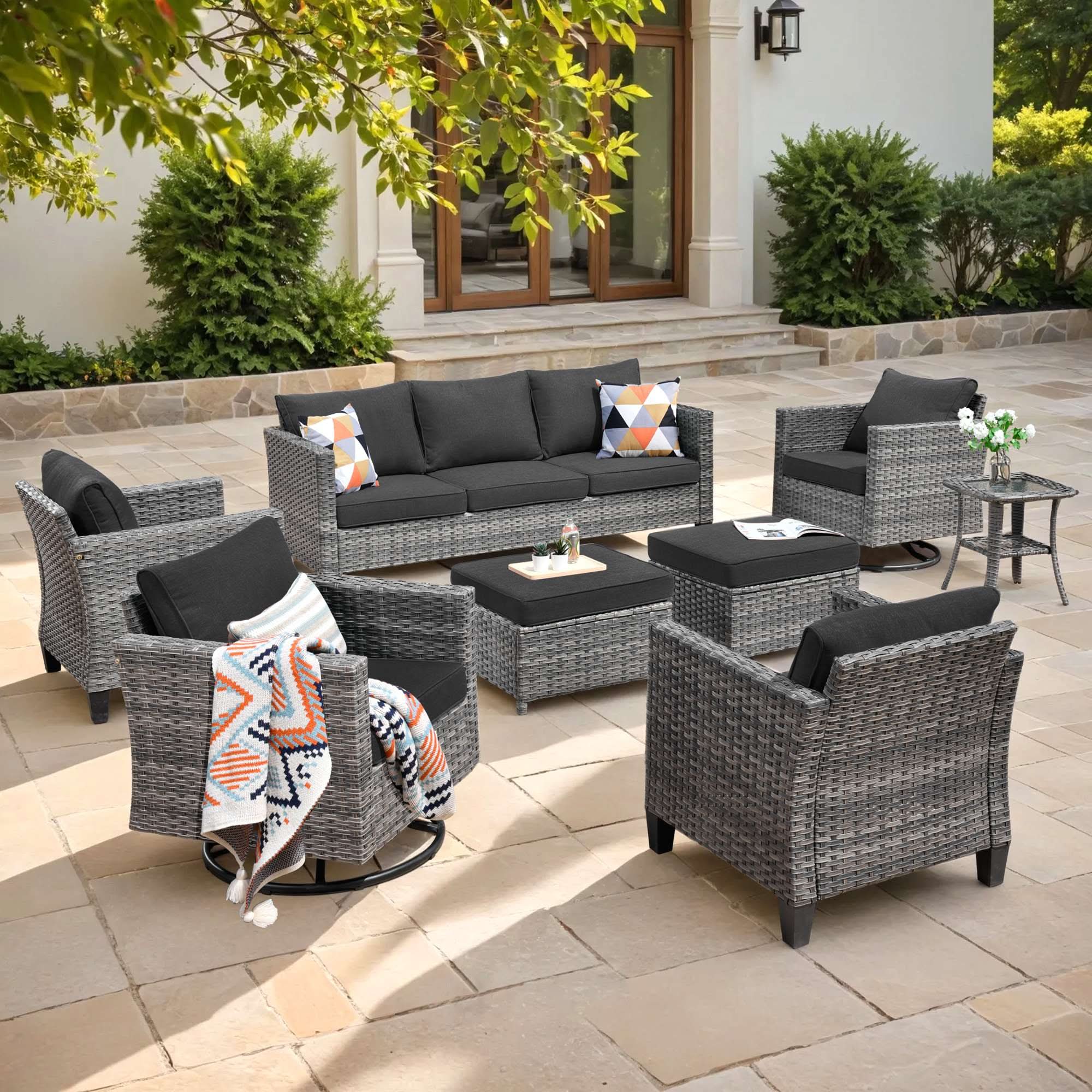 Black | OVIOS 8-piece grey wicker patio set with swivel chairs, 3-seat sofa, ottomans.