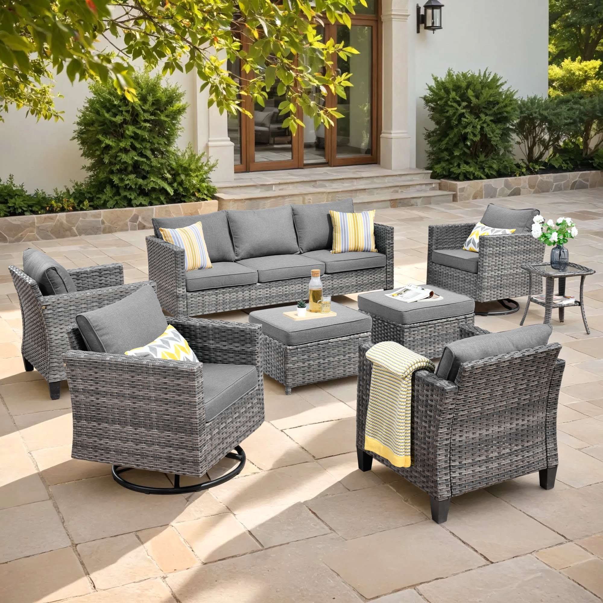 Dark Grey OVIOS 8-piece grey wicker patio conversation set with 3-seat sofa and swivel chairs