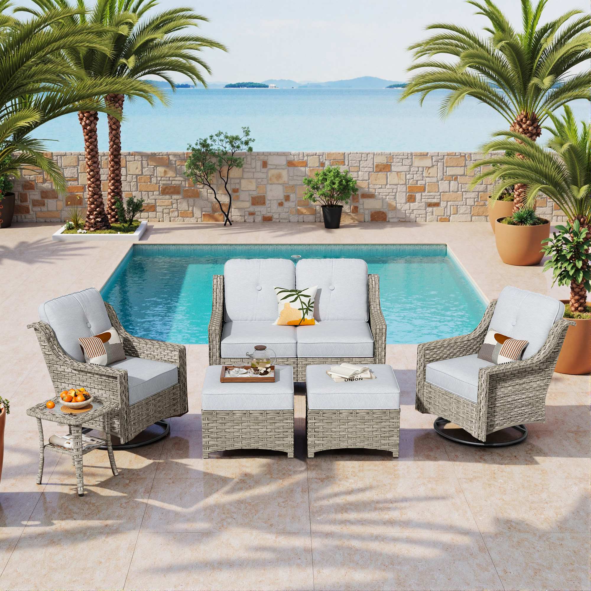 Ovios PAD Series 5-piece outdoor wicker conversation set with swivel chairs and ottomans.