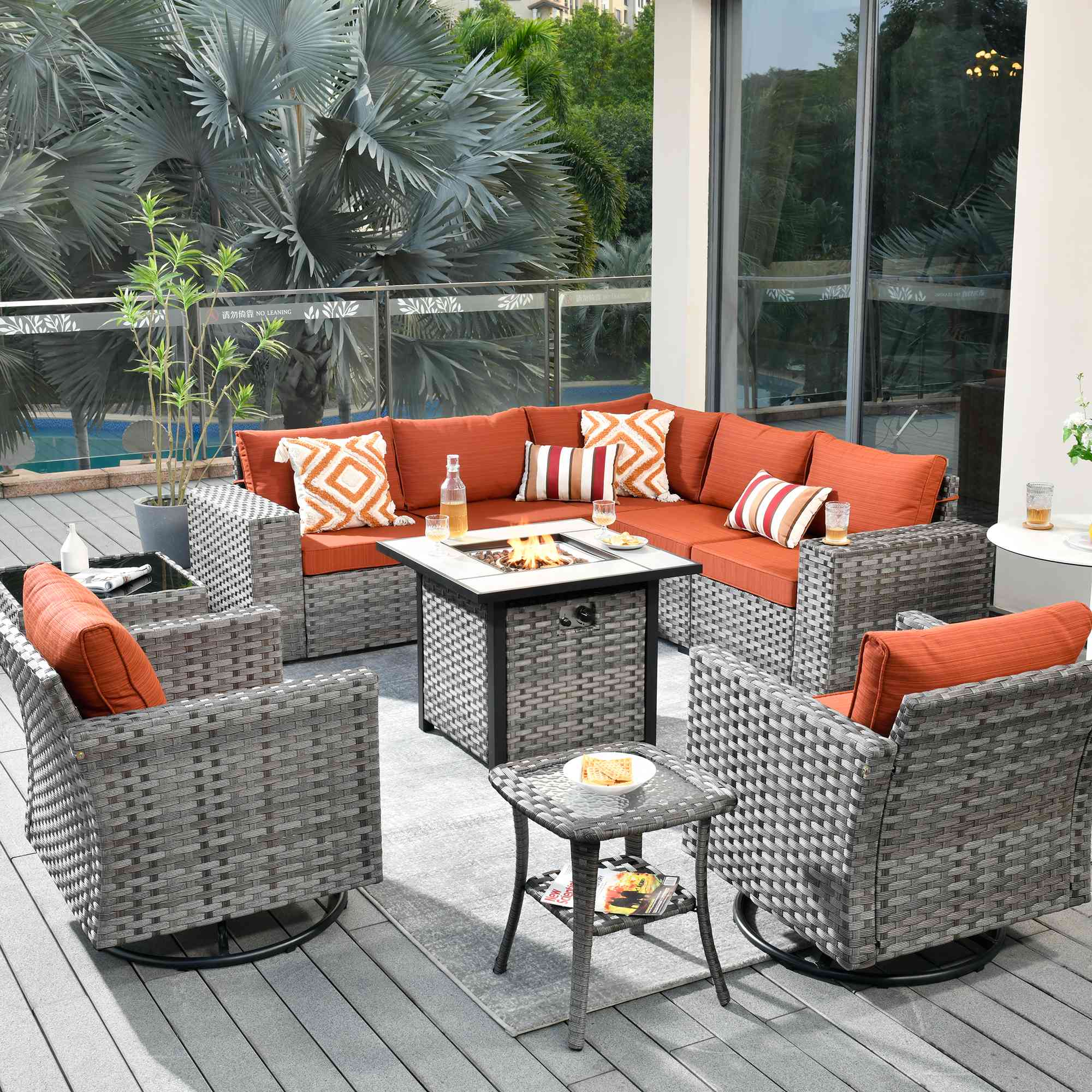 OVIOS patio furniture set: gray wicker sectional, swivel chairs, fire pit table, orange cushions. #color_Orange Red