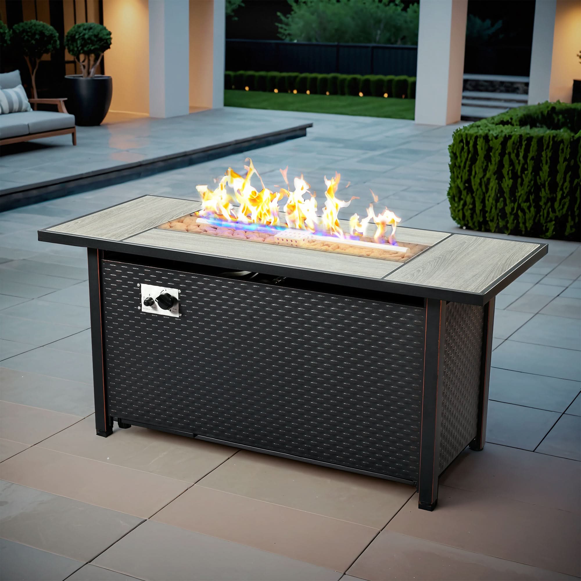 General | Ovios 54'' brown rectangle propane fire pit table with flames, textured base, perfect for outdoor patios.