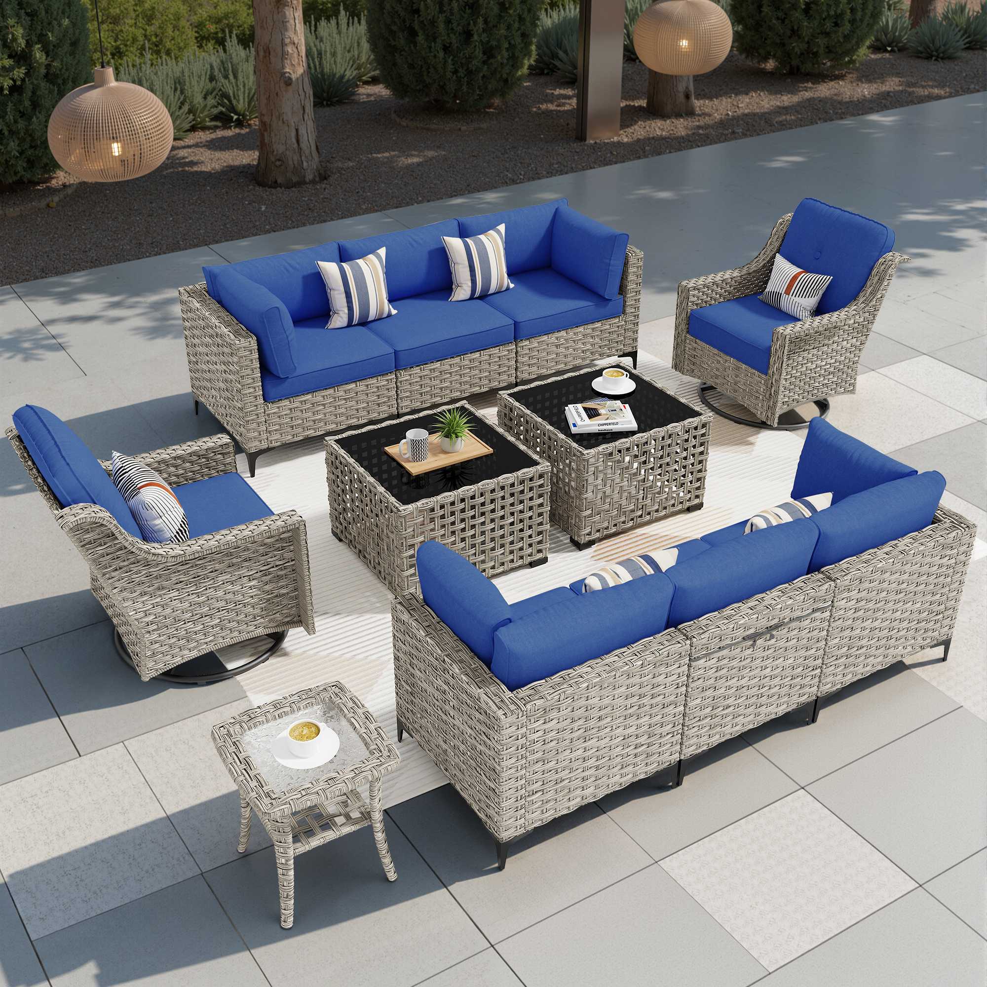 OVIOS modular outdoor wicker patio set with blue cushions, solar light table, and swivel chair